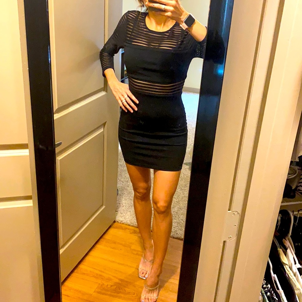 Lulus black dress fitted w transparencies. Size S